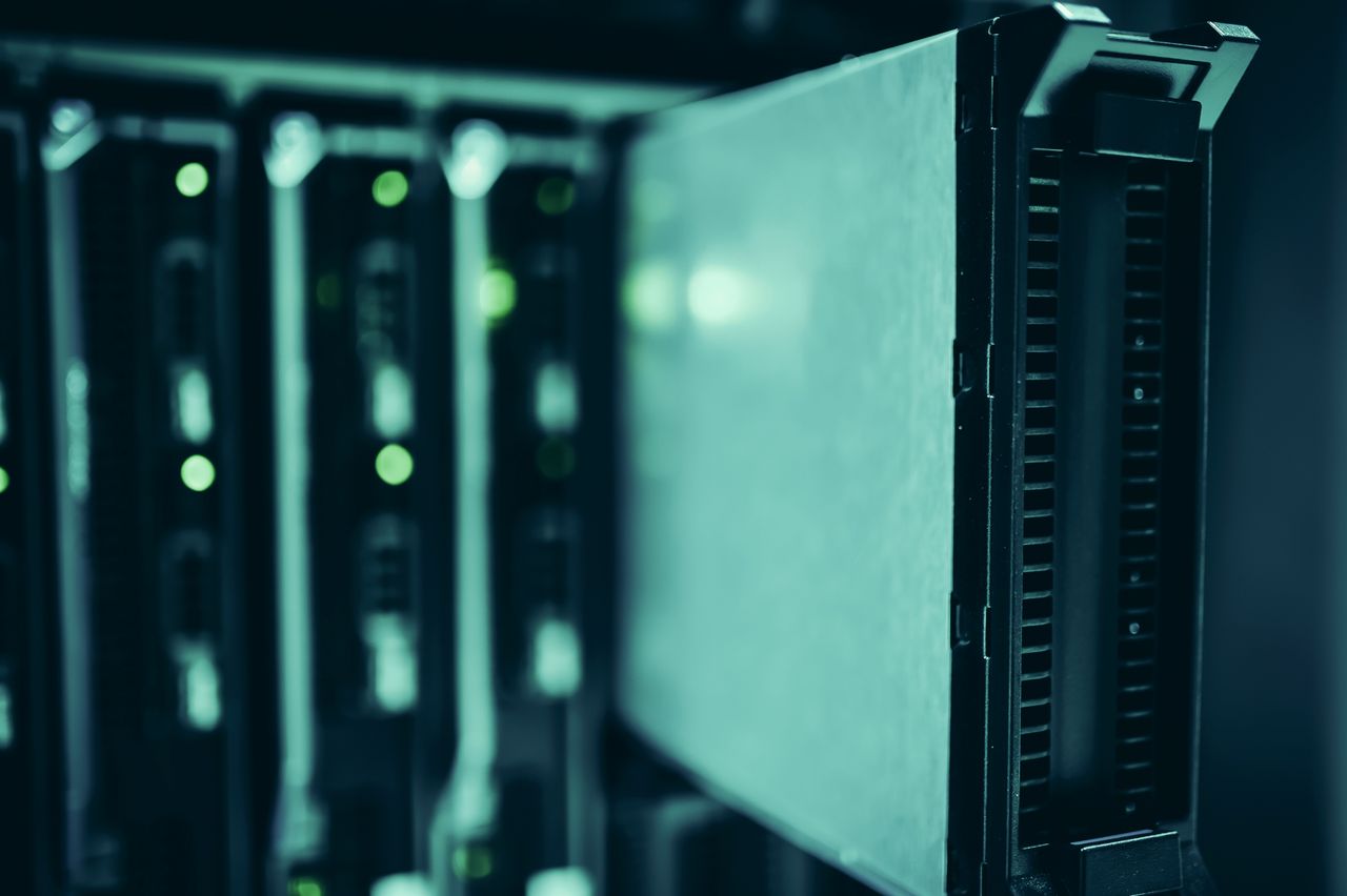 Mastering the First Impression: Your intriguing post title goes here Close-up of server racks in a data center highlighting modern technology infrastructure.